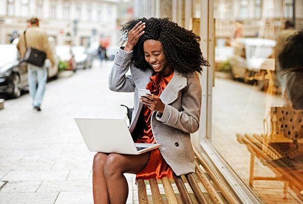 Female Smiling Laptop